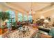 Open floor plan living area with hardwood floors and large windows at 80 Fairview Farms Rd, Shelby, NC 28150