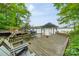 Lakefront dock with multiple slips and seating at 80 Fairview Farms Rd, Shelby, NC 28150