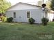 Side view of the house showcasing the gray siding and windows at 115 Sunrise Cir, Shelby, NC 28150