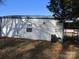 Another side view of a white metal building at 115 Sunrise Cir, Shelby, NC 28150