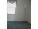 Empty bedroom with carpeted floor and window at 115 Sunrise Cir, Shelby, NC 28150