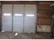 Large metal garage door with windows at 115 Sunrise Cir, Shelby, NC 28150