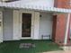 House exterior featuring covered entryway and landscaping at 115 Sunrise Cir, Shelby, NC 28150