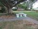 Backyard with stone patio set under a large tree at 115 Sunrise Cir, Shelby, NC 28150