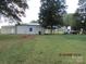 White metal building with a covered carport at 115 Sunrise Cir, Shelby, NC 28150