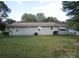 Rear view of house with access to a large backyard at 115 Sunrise Cir, Shelby, NC 28150
