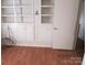 Built-in shelving and cabinets in the dining area at 115 Sunrise Cir, Shelby, NC 28150