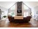 Bright great room with a stunning fireplace, high ceilings, and lots of natural light at 114 Market St, Rockwell, NC 28138