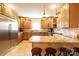 Spacious kitchen with granite countertops and island at 114 Market St, Rockwell, NC 28138