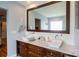 Modern bathroom with double sinks, marble countertops, and large mirror at 114 Market St, Rockwell, NC 28138