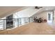 Open loft area with neutral carpeting, perfect for a home office or music room at 114 Market St, Rockwell, NC 28138