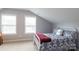 Simple bedroom with a full-size bed, neutral walls, and ample natural light at 114 Market St, Rockwell, NC 28138