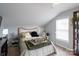 Cozy bedroom with a queen-size bed and plenty of natural light at 114 Market St, Rockwell, NC 28138