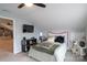 Bright bedroom with a queen bed, built-in shelving and a view to the loft at 114 Market St, Rockwell, NC 28138