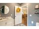 Elegant bathroom with a large vanity, tile flooring, and a shower/tub combo at 114 Market St, Rockwell, NC 28138