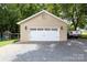 Spacious detached garage with extra storage area at 114 Market St, Rockwell, NC 28138
