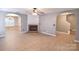 Open living room with hardwood floors and brick fireplace at 12700 Cedar Crossings Dr, Charlotte, NC 28273