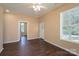 Bright living room featuring hardwood floors and an open floor plan at 1021 Wall St, Statesville, NC 28677