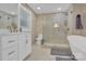 Bathroom with soaking tub, marble vanity, and walk-in shower at 6639 Ronda Ave, Charlotte, NC 28211