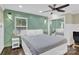 Spacious bedroom with a large bed, stylish wall accents, and ample natural light at 6639 Ronda Ave, Charlotte, NC 28211