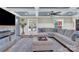 Living room boasts a sectional sofa, fireplace, and updated ceiling design at 6639 Ronda Ave, Charlotte, NC 28211