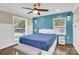 Charming bedroom with a blue accent wall and a comfy bed at 6639 Ronda Ave, Charlotte, NC 28211