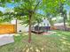 House back view with deck and fenced yard at 6639 Ronda Ave, Charlotte, NC 28211