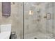Clean bathroom with a large shower, tile surround, and built-in shelving at 6639 Ronda Ave, Charlotte, NC 28211