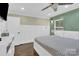 Main bedroom with king-size bed and stylish geometric bedding at 6639 Ronda Ave, Charlotte, NC 28211