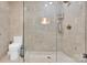 Bathroom with walk-in shower, toilet, and glass enclosure at 6639 Ronda Ave, Charlotte, NC 28211