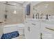 Bathroom with marble vanity, bathtub and shower at 6639 Ronda Ave, Charlotte, NC 28211
