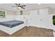 Bedroom with a floral bedspread and white built-in drawers at 6639 Ronda Ave, Charlotte, NC 28211