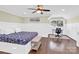 Bedroom with hardwood floors, a ceiling fan, and a workspace at 6639 Ronda Ave, Charlotte, NC 28211