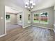 Elegant dining room with hardwood floors and a chandelier at 48 Magnolia St, York, SC 29745