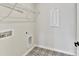 Laundry room with tile flooring, shelving and built-in storage at 1016 Briar Well St, Mint Hill, NC 28227