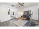 Open living space with hardwood floors and views of kitchen and entryway at 12229 Savannah Garden Dr, Charlotte, NC 28273