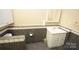 Clean bathroom with tiled floor and a built-in vanity at 6929 Plough Dr, Charlotte, NC 28227