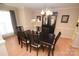 Dining room with dark wood table and hutch at 6929 Plough Dr, Charlotte, NC 28227