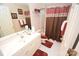 Bathroom with tub shower combo and updated vanity at 6929 Plough Dr, Charlotte, NC 28227