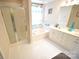 Elegant bathroom with double vanity, soaking tub, and shower at 6929 Plough Dr, Charlotte, NC 28227