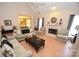 Spacious living room with fireplace and hardwood floors at 6929 Plough Dr, Charlotte, NC 28227