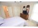 Bedroom with double bed, dresser and en-suite bathroom at 6929 Plough Dr, Charlotte, NC 28227