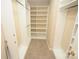 Large walk-in closet with ample shelving and hanging space at 6929 Plough Dr, Charlotte, NC 28227