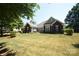 Brick and siding ranch home with landscaped yard at 6929 Plough Dr, Charlotte, NC 28227