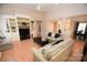 Living room with built-in shelving and hardwood floors at 6929 Plough Dr, Charlotte, NC 28227