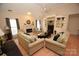 Living room with fireplace and built-in shelving at 6929 Plough Dr, Charlotte, NC 28227