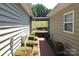 Brick walkway between house and screened porch at 6929 Plough Dr, Charlotte, NC 28227