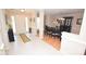 Tiled entryway with view into dining room at 6929 Plough Dr, Charlotte, NC 28227