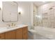 Modern bathroom with light vanity, a large mirror, and a bathtub at 609 Marvin Rd, Marvin, NC 28173