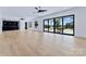 Large basement with hardwood floors and lake views at 18304 Rosapenny Rd, Charlotte, NC 28278